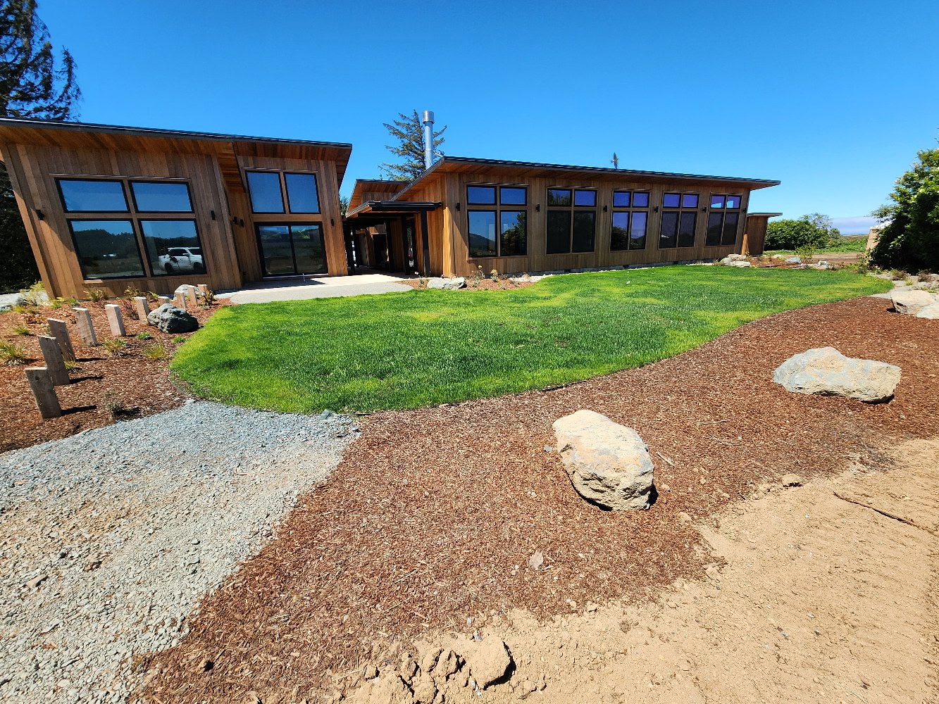 A finished cedar-sided home built by Christopher Swanson Construction in North Bend, Oregon
